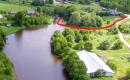 Vandens pakrantėje parduodamas 122 arų ploto sklypas su mūriniu 849 m2 ploto pastatu ir pakrantės mišku šalia Vilniaus-0