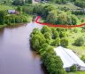 Vandens pakrantėje parduodamas 122 arų ploto sklypas su mūriniu 849 m2 ploto pastatu ir pakrantės mišku šalia Vilniaus-0