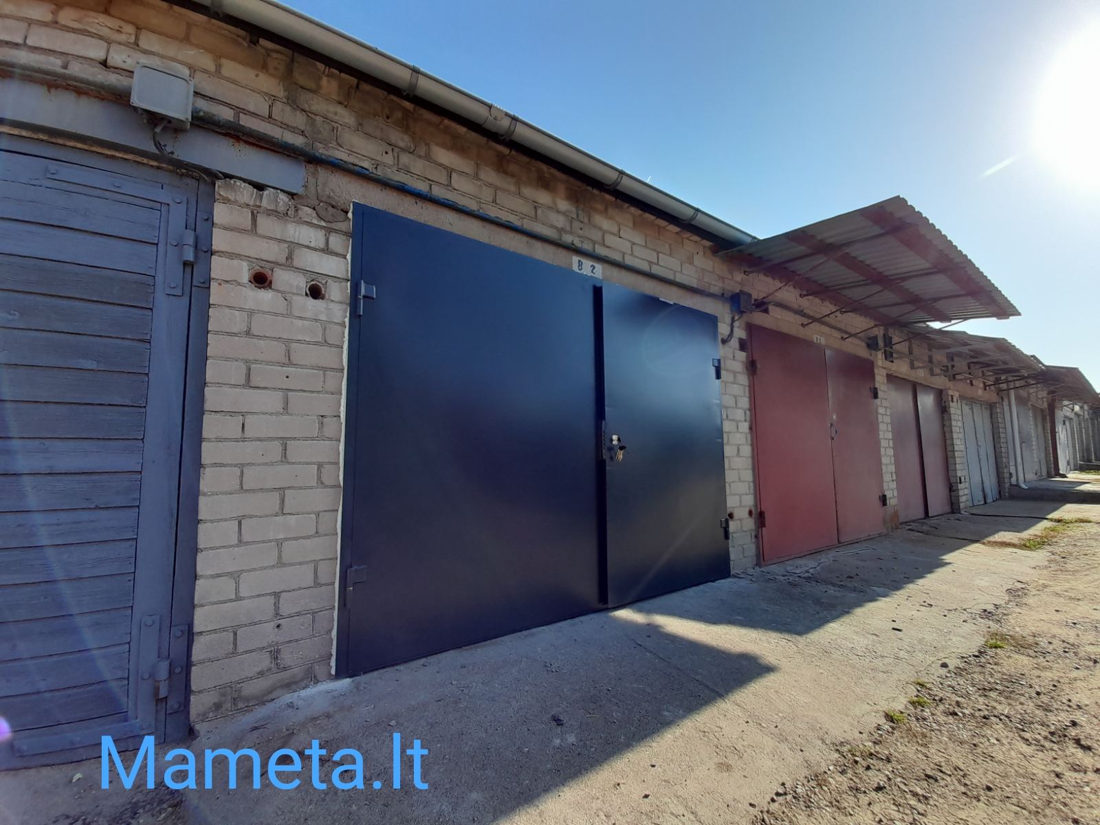 Metaliniai garažo vartai, durys.-0