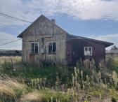 Žemės sklypą su statiniais, adresu Kelmės raj. sav.,  Šaukėnų sen., Beržėnų II k. 2 A.-0