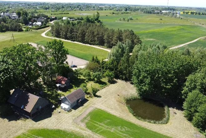 PARDUODAMA SODYBA SU DIDELIU SKLYPU IR ŪKINIAIS PASTATAIS KYBARTUOSE!-0