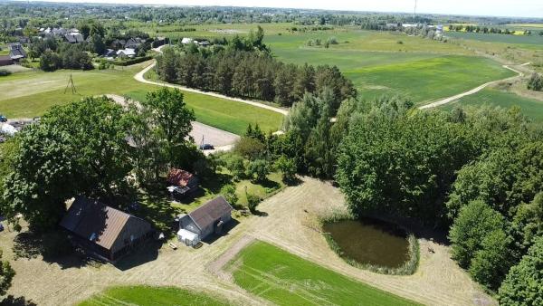 PARDUODAMA SODYBA SU DIDELIU SKLYPU IR ŪKINIAIS PASTATAIS KYBARTUOSE!-0